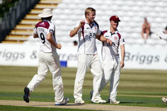David Willey is congratulated after taking the wicket of Lancashire's Andrea Agathangelou