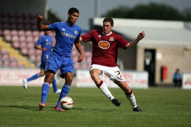 KIDS CLASH - the Cobblers played a Chelsea under-21s team as part of their preparation for last season