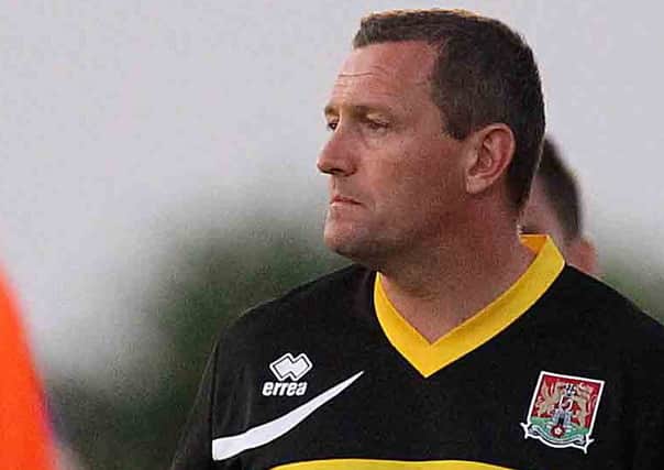 Aidy Boothroyd watches his Cobblers team beat Cogenhoe United 6-0