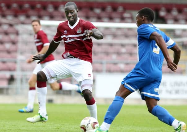 LONGER LOOK - the Cobblers are currently running the rule over defender Kevin Amankwaah
