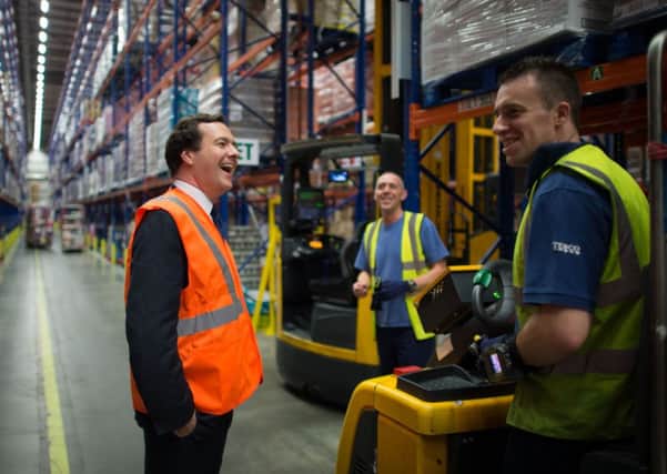 Chancellor of the Exchequer George Osborne meets staff at Tesco's National Distribution Centre near Daventry. Picture: Stefan Rousseau/PA Wire