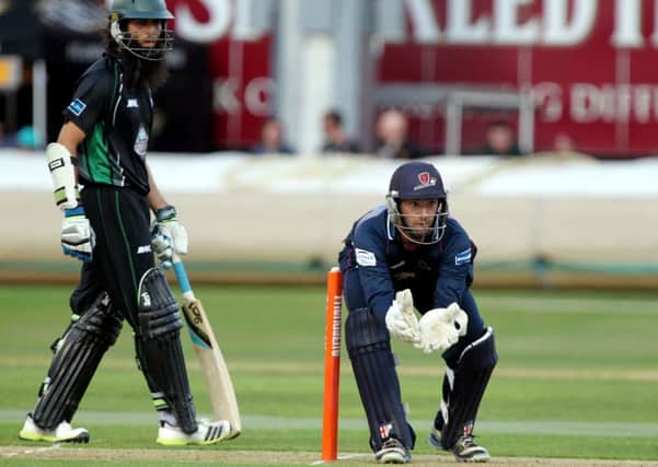 Moeen Ali (left) made 72 in Worcestershire's 182-6