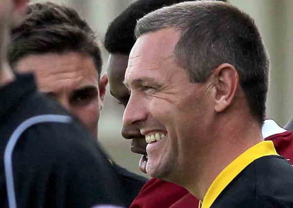 EXCITED - Cobblers boss Aidy Boothroyd