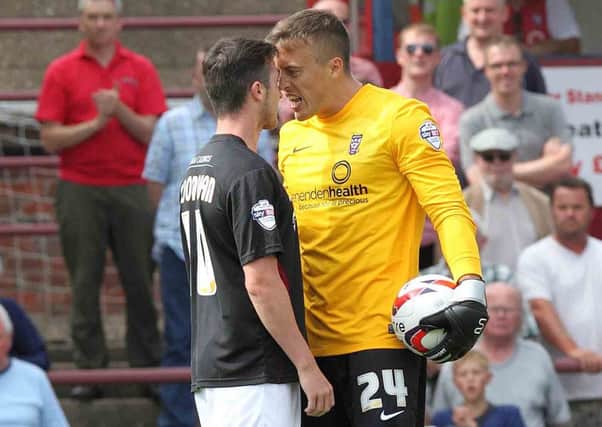 Roy O'Donovan squares up to York City goalkeeper Michael Ingham (picture: Sharon Lucey)