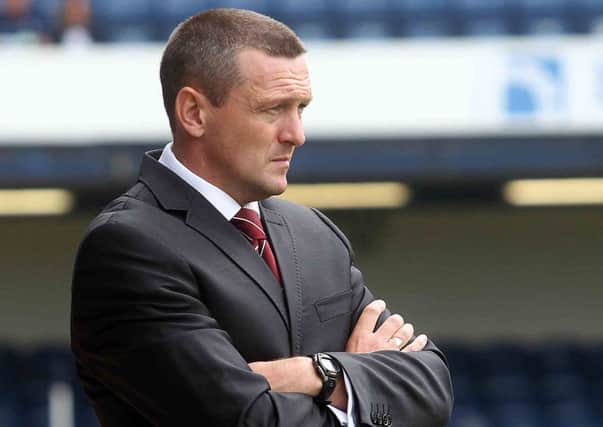 UNHAPPY MAN - Cobblers boss Aidy Boothroyd takes in the action at Roots Hall (pictures: Sharon Lucey)
