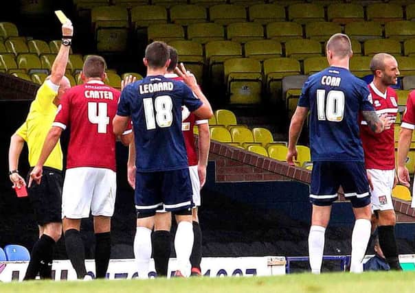 COSTLY MISTAKE - Chris Hackett (far right) was sent off for two bookings in the space of 22 minutes at Southend last week