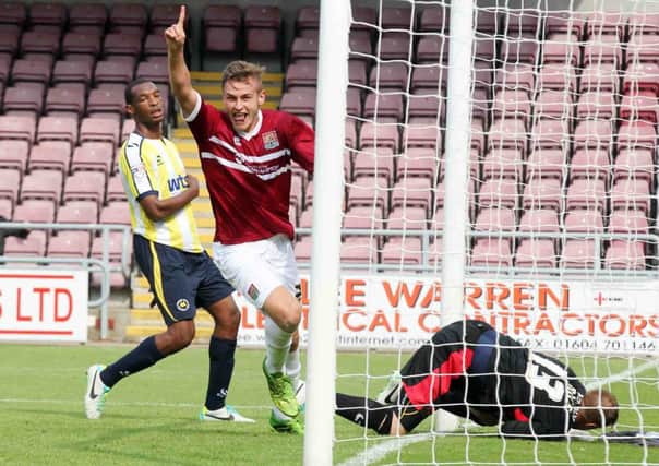 GOAL - Jacob Blyth celebrates after heading the Cobblers in front against Torquay (pictures: Kirsty Edmonds)