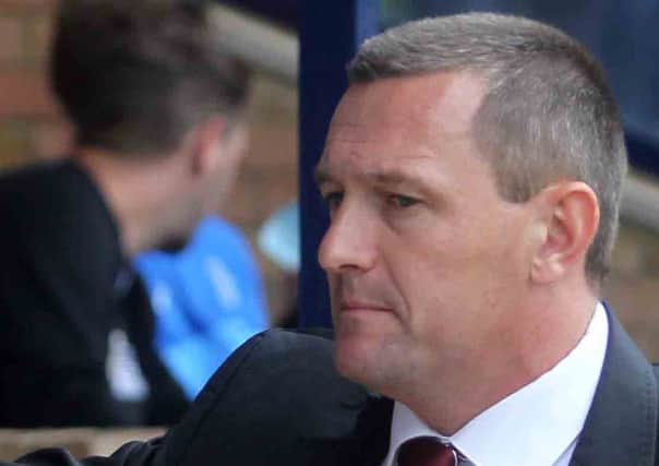 STAYING RELAXED - Cobblers boss Aidy Boothroyd