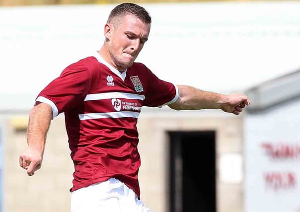REVENGE MISSION - Lee Collins says the Cobblers owe MK Dons one following the Capital Once Cup clash between the sides earlier this season