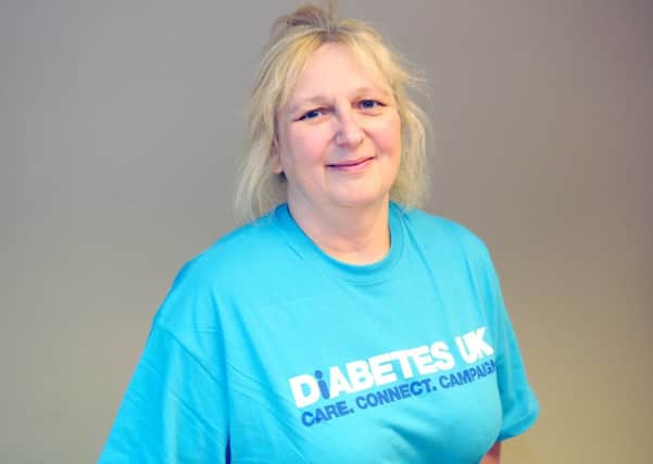Pictured,Leigh White running a diabetes helpline for those with the condition.
MHDE-07-02-14-PeertoPeer-Feb08