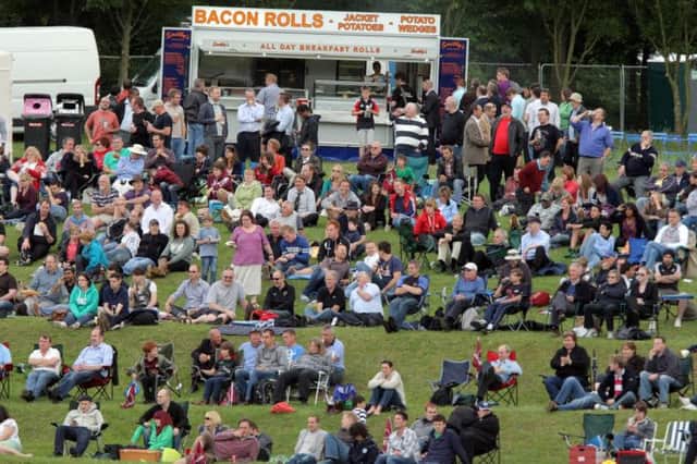 Spectators make use of the bank to watch Northamptonshire on their last visit to Campbell Park back in 2011