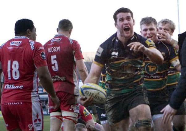 BIG MOMENT - Claum Clark celebrates scoring his first Premiership try for Saints in the win over Gloucester (Pictures: Linda Dawson)