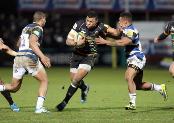 UP FOR THE FIGHT - Luther Burrell brushes off Bath players in Saints' win at Franklin's Gardens in December (Picture: Linda Dawson)