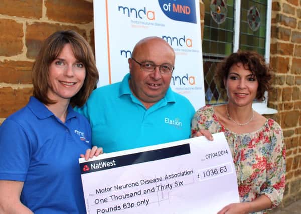 Paula McGrath, Editor at the MND Association and choir member; Vince Collins, Elation Community Voices Chairman; Jo Burkimsher, Association Visitor