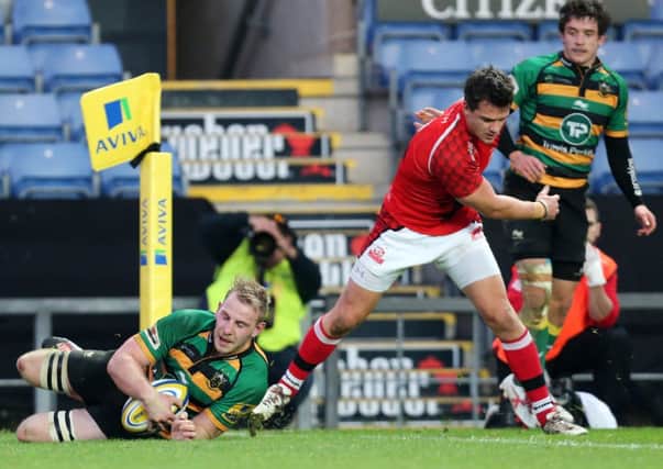 DOTTING DOWN - Ben Nutley goes over for his try for Saints against London Welsh (Pictures: Kirsty Edmonds)