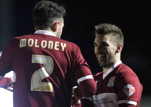 HAPPY MAN - Ricky Holmes is all smiles after scoring against Portsmouth (Pictures: Sharon Lucey)