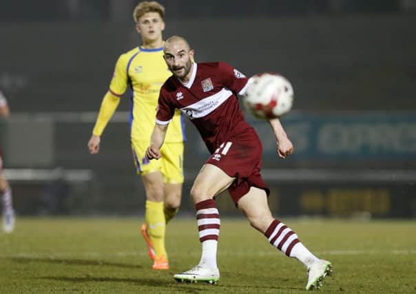 FRUSTRATING NIGHT - Chris Hackett in action during the Cobblers' defeat to Carlisle at Sixfields (Pictures: Kirsty Edmonds)