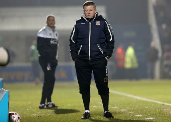 BAD NIGHT - Cobblers boss Chris Wilder shows his disappointment during his team's 2-0 defeat to Carlisle (Pictures: Kirsty Edmonds)