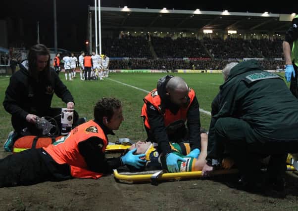 George North was stretchered off after Hughes's knee made contact with his head (picture: Sharon Lucey)