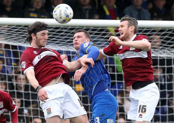 BACK IN ACTION - Zander Diamond (right) made his first start for the Cobblers since the beginning of February (Picture: Sharon Lucey)