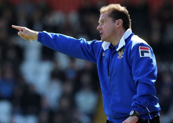 Stevenage boss Graham Westley watches his team beat the Cobblers on Saturday (Picture: Sharon Lucey)