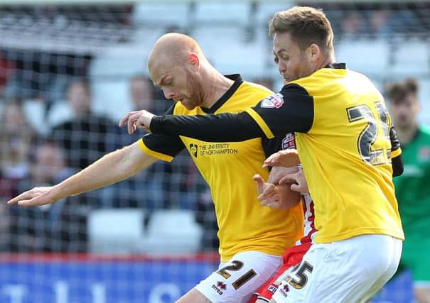 WANTED MEN - Cobblers boss Chris Wilder is keen for Jason Taylor and Joel Byrom to stay at the club next season (Picture: Sharon Lucey)