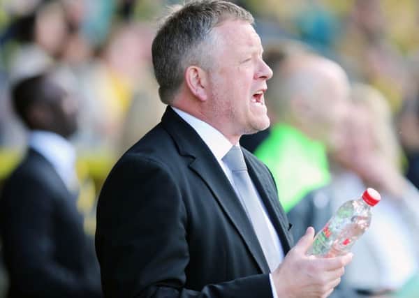BAD DAY - Cobblers boss Chris Wilder watches his team lose 3-1 at Burton Albion (Picture: Kirsty Edmonds)