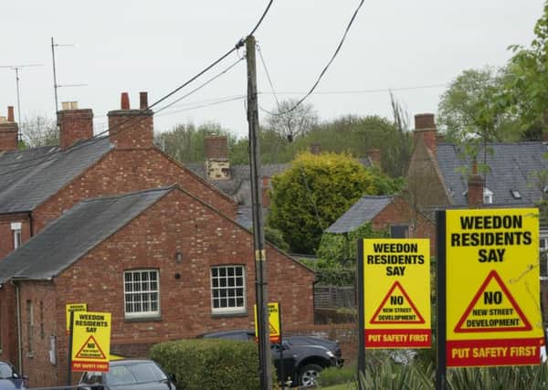 Just a few of the signs up in Weedon