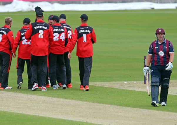JOY AND PAIN - the Durham players celebrate following the dismissal of Steelbacks opener Richard Levi (Pictures: Ian Horrocks)