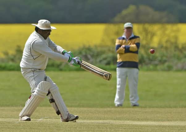 HITTING OUT - action from Mears Ashby IIs clash with Weekley & Warkton IIIs (Pictures: Dave Ikin)