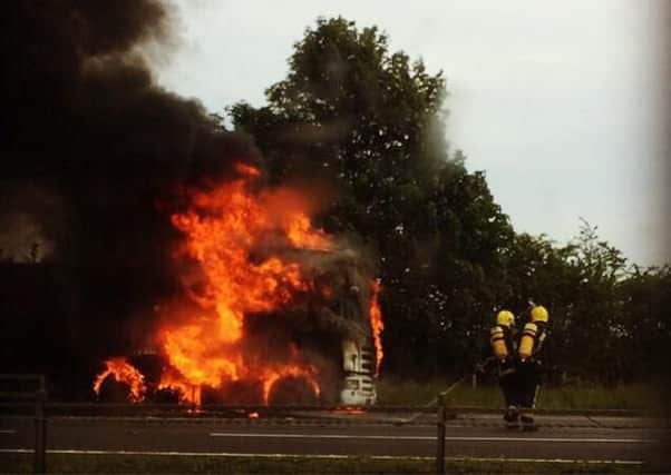 Lorry bursts into flames after explosions near Silverstone