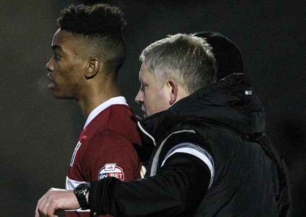 Cobblers manager has hailed the attitude of teenage striker Ivan Toney