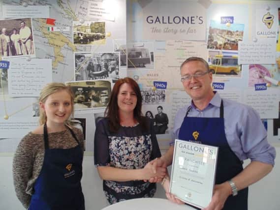 Andy Hambidge with Cathy Gallone (centre), and a member of parlour staff. NNL-150715-104214001
