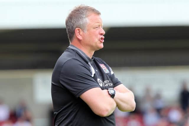 Chris Wilder watches on during his side's friendly defeat to Derby County at Sixfields. Pictures by Sharon Lucey