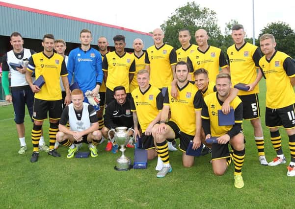 The Cobblers players with the Maunsell Cup (pictures: Sharon Lucey)