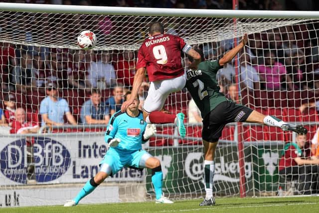 Cobblers skipper Marc Richards heads wide (pictured by Sharon Lucey)
