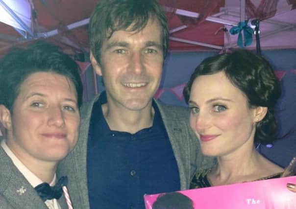 Lisa Porter, left, and Laura Crouch, right, with their hero Mark Morriss, from band the Bluetones. The couple managed to secure Mark to play at their wedding on Friday, but feared they would have to cancel the big day when their reception venue fell through. RTzTfgW21B1ioeafce8Z