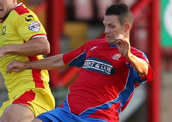 STILL A THREAT - Jamie Cureton, who turned 40 last week, is set to lead the Dagenham attack at Sixfields on Saturday