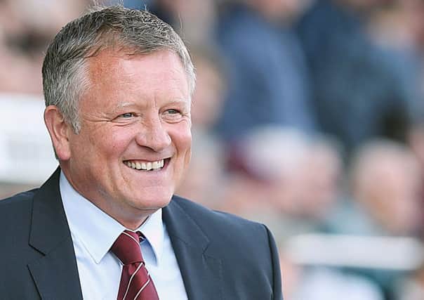 HAPPY MAN - Cobblers boss Chris Wilder has strengthened his squad with the loan signings of Darnell Furlong and Shaun Brisley