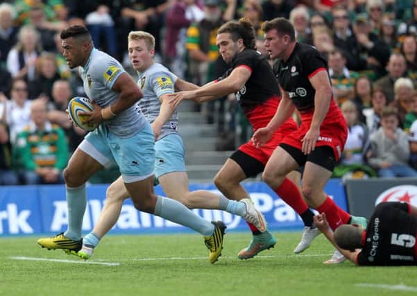Luther Burrell stormed in for the second of his two tries (pictures: Sharon Lucey)