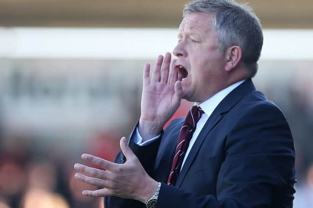 Chris Wilder barks out the instructions during his side's game with Leyton Orient at Sixfields. Picture by Kirsty Edmonds