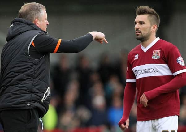 Chris Wilder (left) can't wait to be able to call on the services of Ricky Holmes (picture: Sharon Lucey)