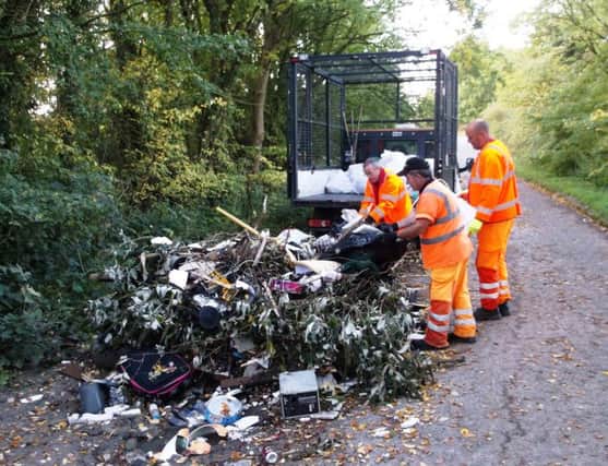 Rubbish dumped near Silverstone is being cleared by South Northamptonshire Council workers