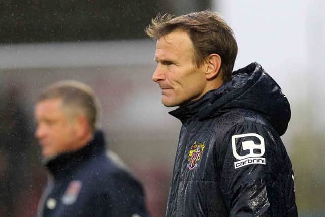 Teddy Sheringham out in the rain on the Sixfields touchline (picture by Sharon Lucey)