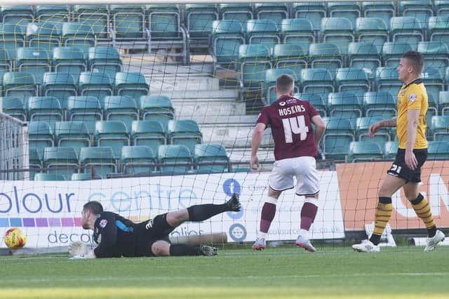 Sam Hoskins taps home to put Northampton ahead against Newport. Picture by Kirsty Edmonds
