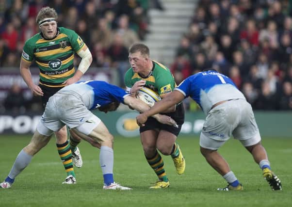 NO WAY THROUGH - Alex Waller gets caught in a Saracens sandwich (Pictures: Kirsty Edmonds)