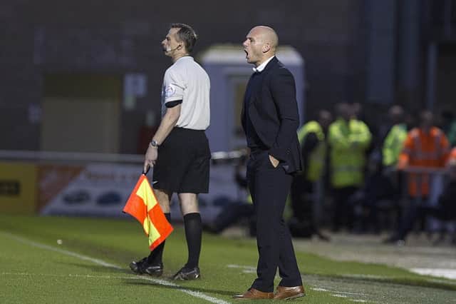 Stags boss Adam Murray barks out the instructions on the Sixfields touchline. Picture by Kirsty Edmonds