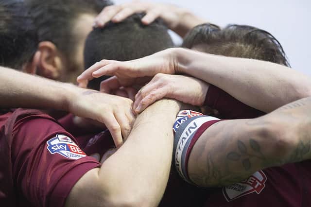 Close up: Cobblers celebrate Marc Richards' winner (pictures by Kirsty Edmonds)