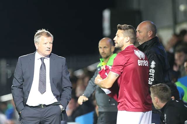 Chris Wilder and Marc Richards have both turned down approaches from other clubs to remain at Northampton