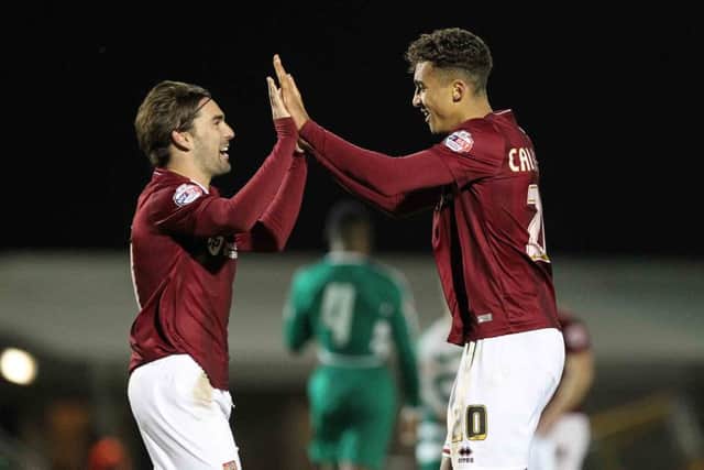 Scorer of the winning goal Dominic Calvert-Lewin celebrates with creator Ricky Holmes. Pictures by Sharon Lucey